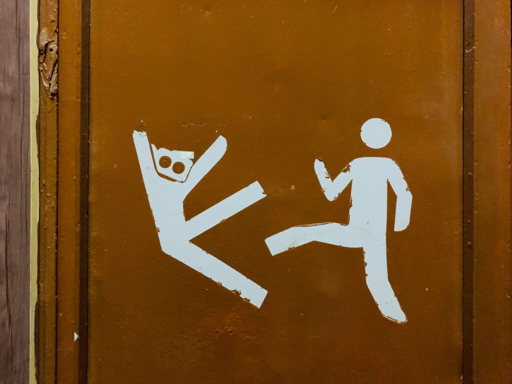 A stick figure kicking another stick figure