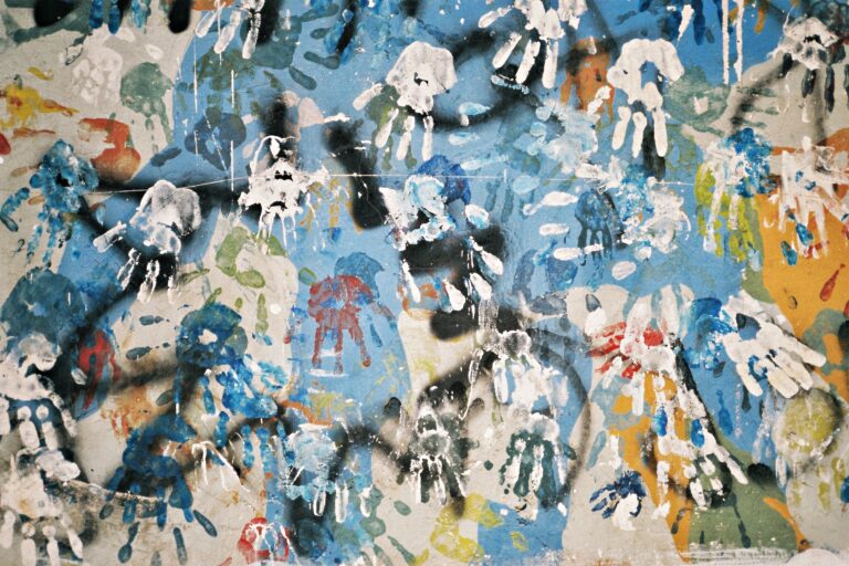 multiple handprints made out of paint