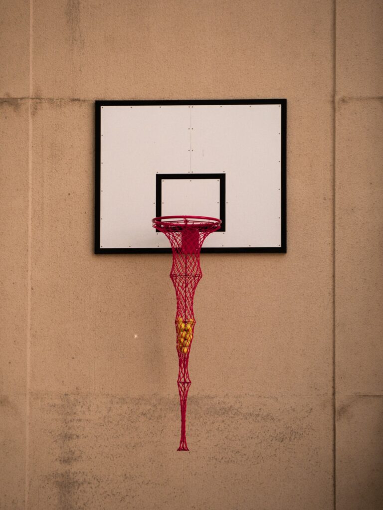 A basketball hoop with the basket drooping