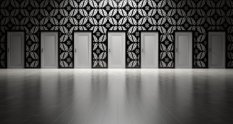 Multiple similar doors lined next to each other