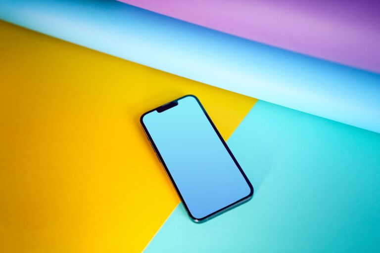 A smartphone on a colorful surface