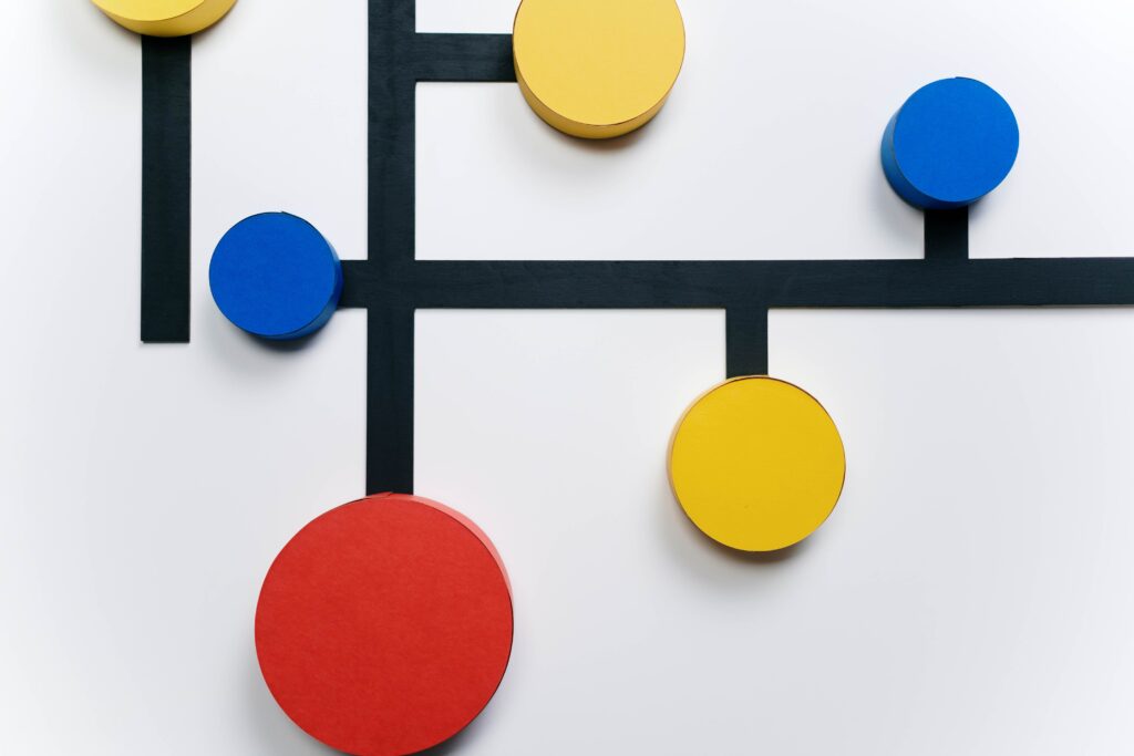 Colored pucks connected by black lines